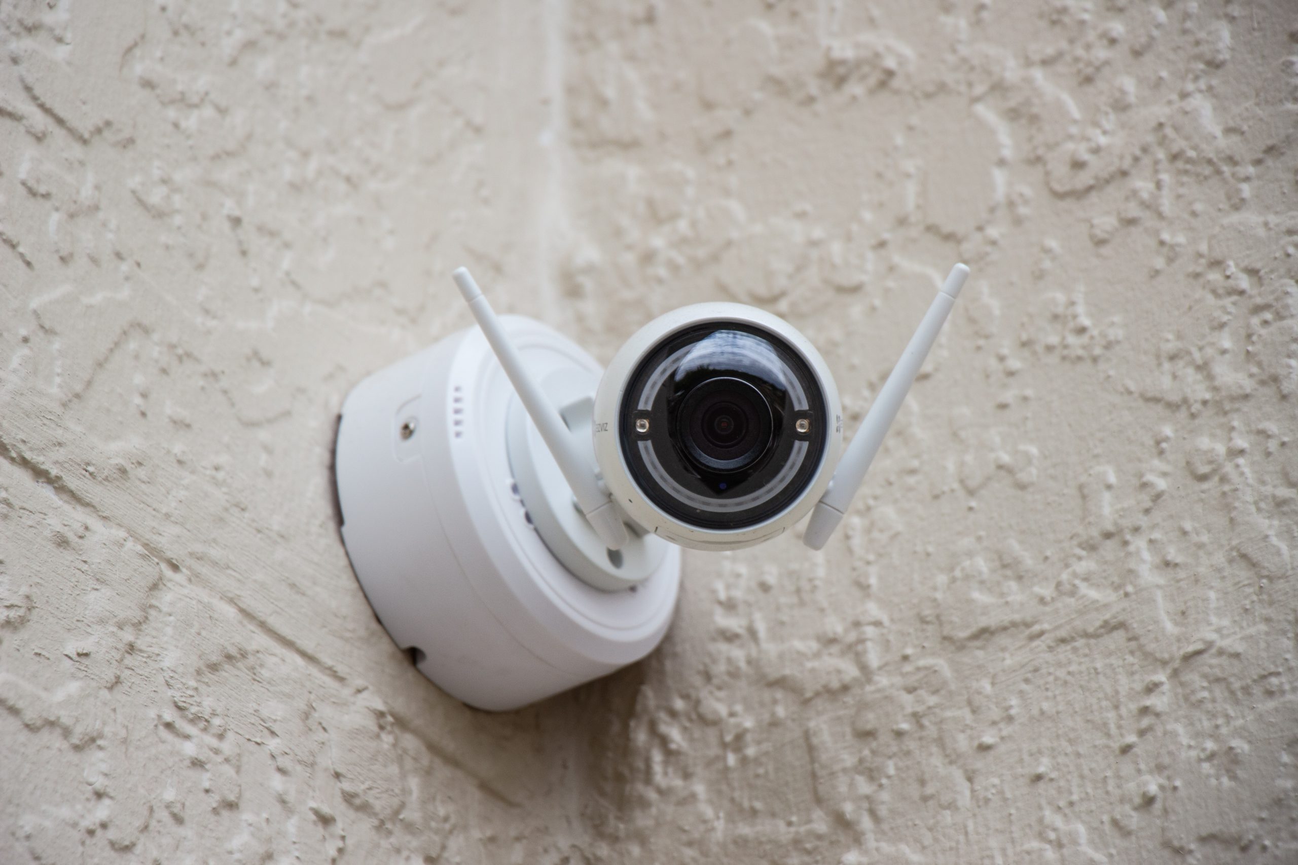 Security Camera On a wall pointed at the ground 